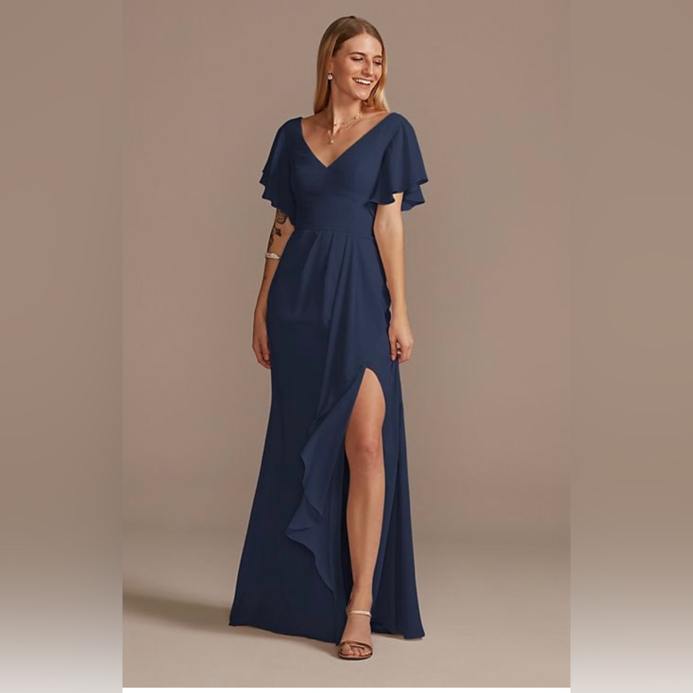 David’s Bridal Flutter sleeve bridesmaid dress with
cascade. Navy blue